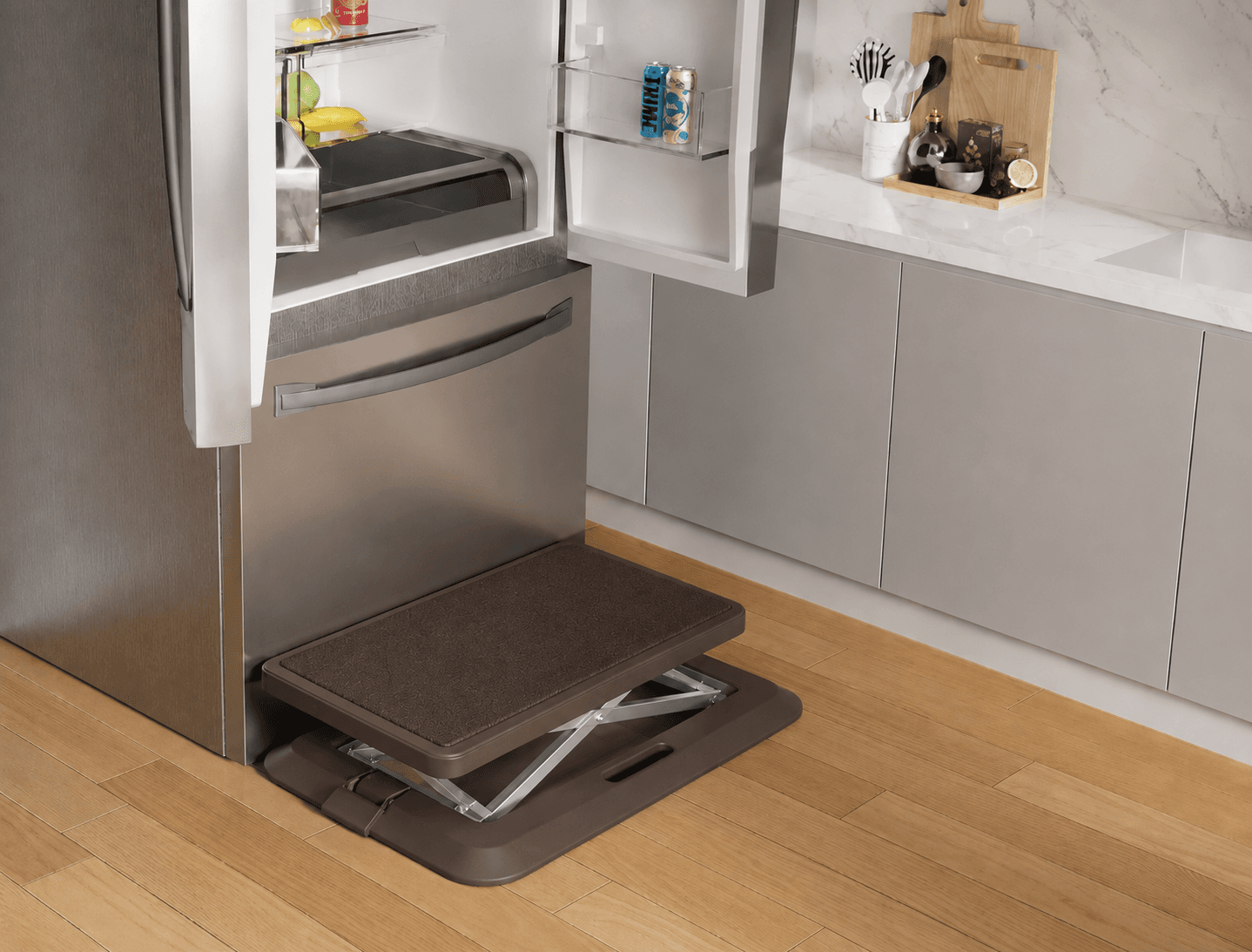 Rizer Mat positioned in front of an open refrigerator