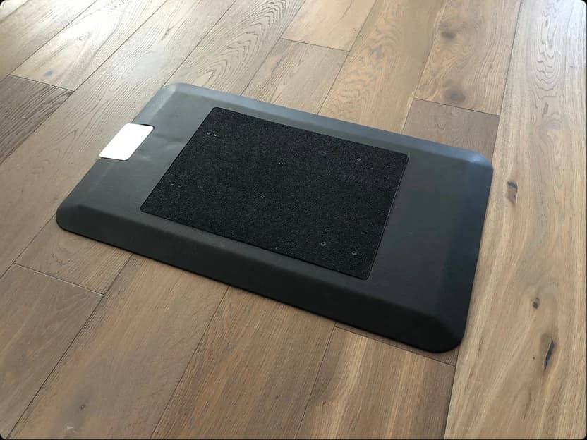 Rizer Mat prototype flat on a wood floor